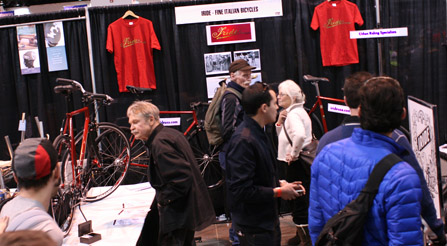 photo of curious people occupy IRIDE italian booth at NAHBS North American Handmade Bicycle Show urban bikes
